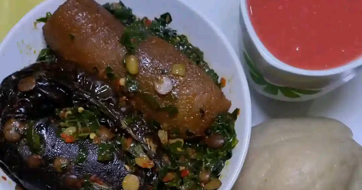 Swallow with vegetable soup and watermelon juice