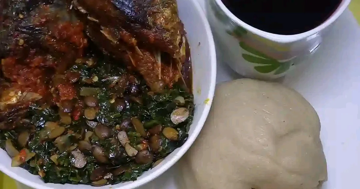 Swallow with fish vegetable soup and zobo